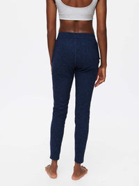 Back view of CloudKnit Sweatpant in Navy, with the mid-rise design and custom-fit waistband.