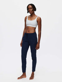 Model standing in CloudKnit Sweatpant in Navy, featuring a custom-fit drawstring waistband and side pockets.