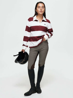 Stylish model wearing a Club Polo with ribbed cuffs, for fall layering in elegant equestrian apparel.