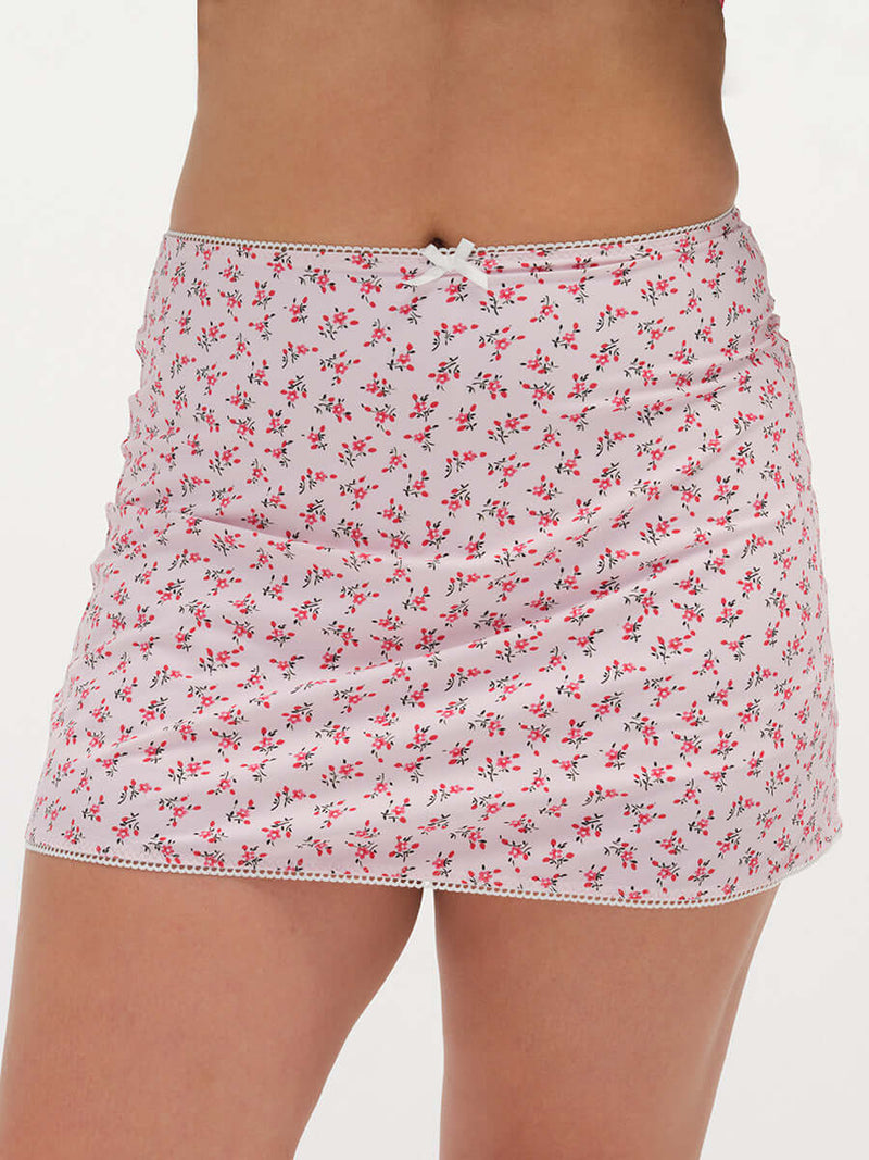 Close-up view of Club Skort in floral print, featuring a cute bow and lightweight, breathable fabric.