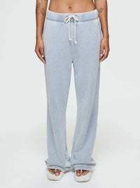 Model wearing Desert Pant in light blue, featuring an elastic waistband and wide-leg design.