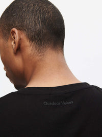 Back view of Everyday Classic Shortsleeve in Black, showing the soft fabric and relaxed fit.