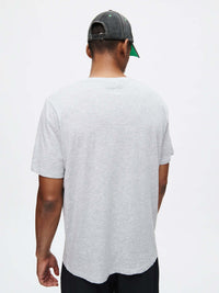 Back view of Everyday Classic Shortsleeve in Grey, soft organic cotton jersey for low-sweat recreation.