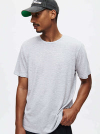 Model wearing Everyday Classic Shortsleeve in Gray, soft and breathable organic cotton jersey.