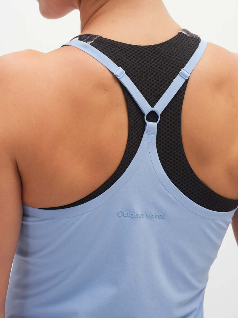 Back view of The Exercise Dress in Light Blue with adjustable straps and built-in shorts liner for activewear.