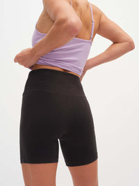 Back view of Echo 5.5" Short in Cotton Candy, featuring a tall waistband for added support.