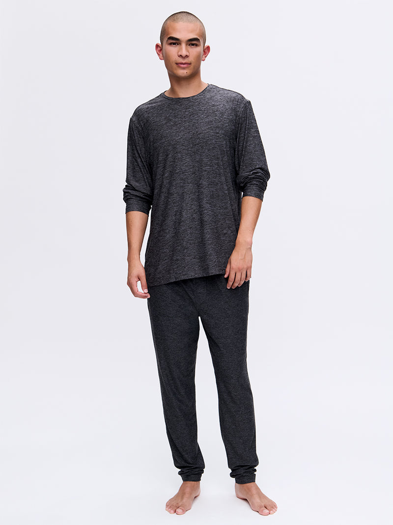 Model wearing CloudKnit Longsleeve in Dark Gray, featuring a relaxed fit and lightweight fabric, styled for lounging.