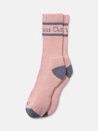 Flat lay of OV Club Crew Sock in Pink and Blue, featuring sweat-wicking fabric and printed branding.