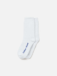 Flat lay of OV Comfort Sock in White, featuring full-cushion design for comfort and performance apparel.