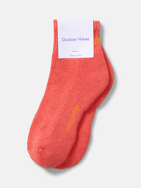 Flat lay of OV Rec Ankle Sock in Coral, showing reinforced toe and heel.