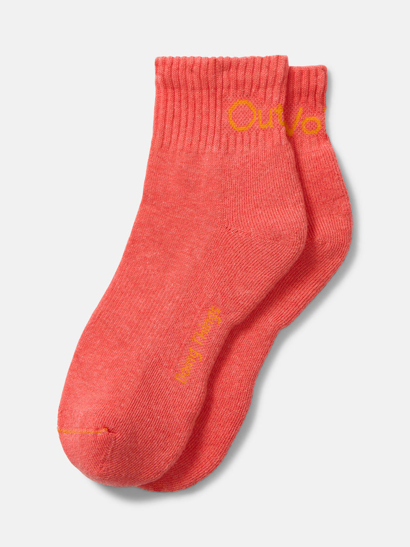 Flat lay of OV Rec Ankle Sock in Coral, featuring a ribbed ankle with bright yellow text.