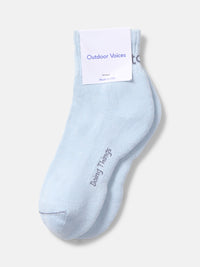Flat lay of OV Rec Ankle Sock in light blue, featuring a soft texture and cushioned bottom.