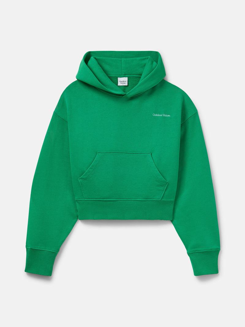 Front view of Pickup Organic Cropped Hoodie in vibrant green, featuring a relaxed fit and cozy material.