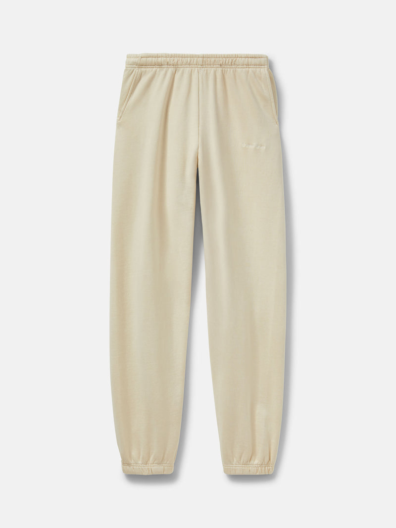 Flat lay of Pickup Organic Sweatpant in Cream, featuring elastic waistband with drawstring and pockets.