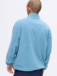 Back view of RecFleece 1/2 Zip in Light Blue, with the relaxed fit and soft fabric.