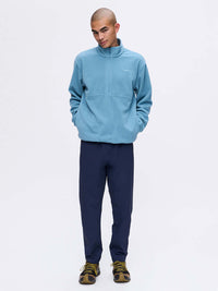 Model wearing RecFleece 1/2 Zip in Light Blue, featuring a front ½ zip and relaxed fit, ideal for everyday wear.