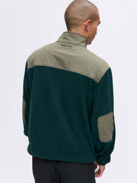 Back view of RecFleece Relaxed Full Zip in Dark Green, featuring contrasting shoulder panels and elbow patches.