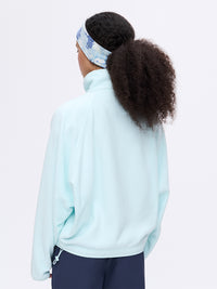 Back view of RecFleece Snap Jacket in Light Blue, with the soft fleece material and relaxed fit.