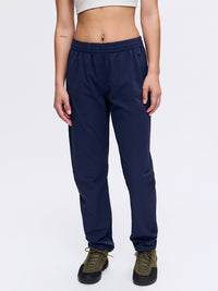 Model wearing RecTrek 29" Pant in Navy, featuring a custom-fit drawstring and relaxed fit.