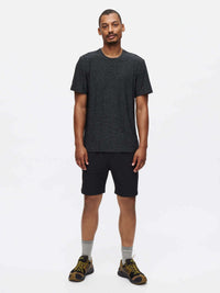 Model wearing RecTrek 7" Short in Black, with a sleek design ideal for active pursuits.