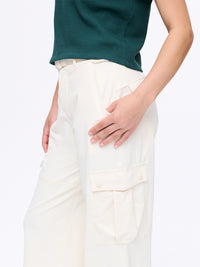 Model wearing RecTrek Cargo Pant in Cream, featuring utility-style pockets and a relaxed fit, ready for everyday wear.