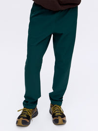 Model standing in RecTrek Pant in Dark Teal, featuring a relaxed fit and comfortable elastic waistband.