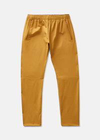 Flat lay of RecTrek Pant in Gold, featuring a relaxed fit and zippered pockets for comfort during activities.