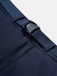Close-up view of RecTrek Zip-Off Pant in Navy, showing the adjustable waistband with buckle detail.