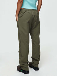 Back view of RecTrek Zip Pant in Olive, featuring a comfortable elastic waistband and practical back pocket.