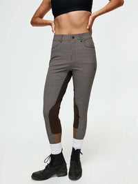 Ride Pant featuring stretch-woven fabric, faux-suede patch, and hand-embroidered OV signature for riders.