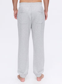 Back view of Stratus Sweatpant in Light Grey, featuring a relaxed fit and two back pockets.