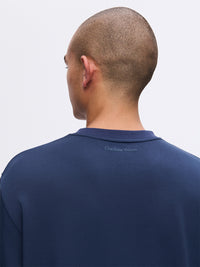 Back view of Stratus Sweatshirt in Navy, showing the relaxed fit and soft fabric ideal for lounging.