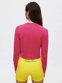 Back view of Sugar Cardigan in Pink, showing the soft cotton cashmere fabric.