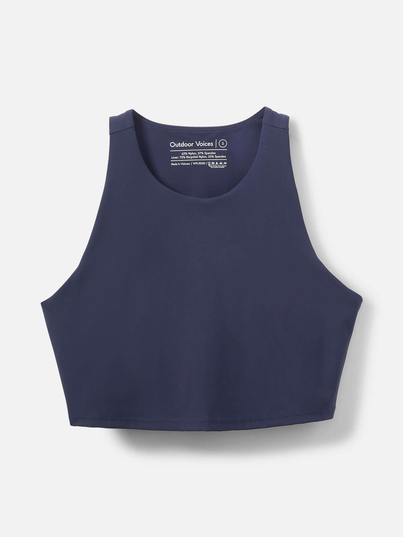 SuperForm Crop Top in navy blue, featuring a built-in shelf bra and high-coverage neckline for light support.