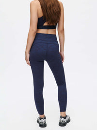 Back view of TechSweat Core 7/8 Legging in Navy, featuring an engineered waistband for high intensity activity.