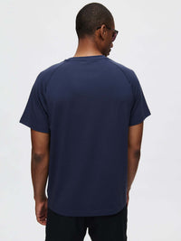 Back view of ThinkFast Mesh Shortsleeve in Navy, featuring a classic fit and cooling fabric for activewear.