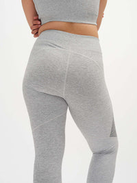Back view of Two Tone 7/8 Legging in grey, with the two-tone paneling detail.