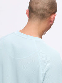 Back view of Waffle Longsleeve in Light Blue showing soft waffle knit texture and relaxed fit.