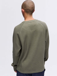 Back view of Waffle Longsleeve in Olive Green, with the comfortable waffle knit texture.