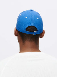 Back view of Doing Things Washed Hat in Bright Blue with adjustable strap and casual fit, styled for everyday wear.