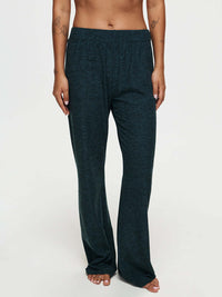 Model wearing CloudKnit Wide Leg Pant made of soft, breathable fabric for maximum comfort.