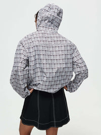 Back view of Windbreaker in mineral blue plaid, featuring a lightweight and water-resistant fabric.