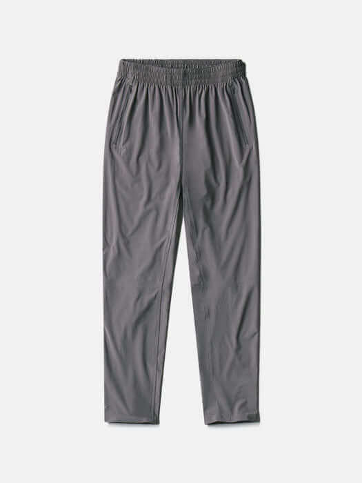 Flat lay of Zephyr 29" Pant in Gray, featuring a custom-fit drawstring waist and zippered pockets.